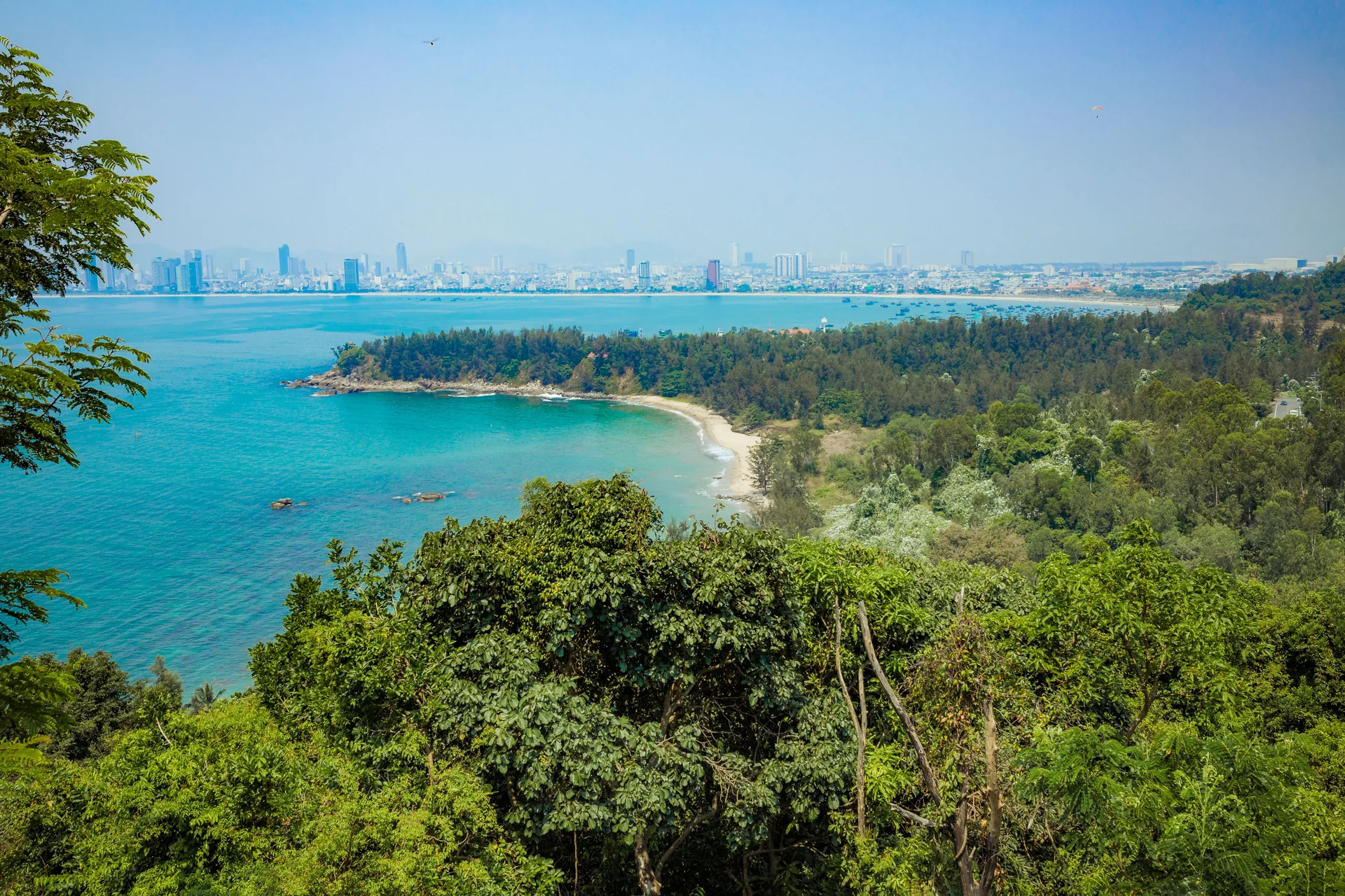 Da Nang coastline, city and a green hillside viewed from above