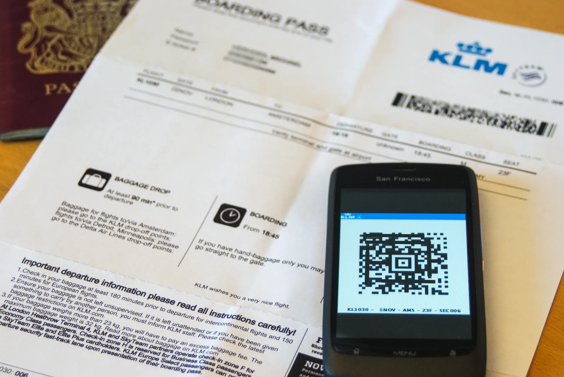 Passport, paper boarding pass, and mobile boarding pass without personal data